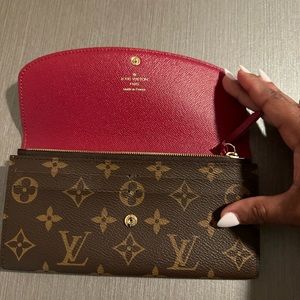 Authentic pre-loved Louis Vuitton Emilie Wallet in Monogram and Fuschia